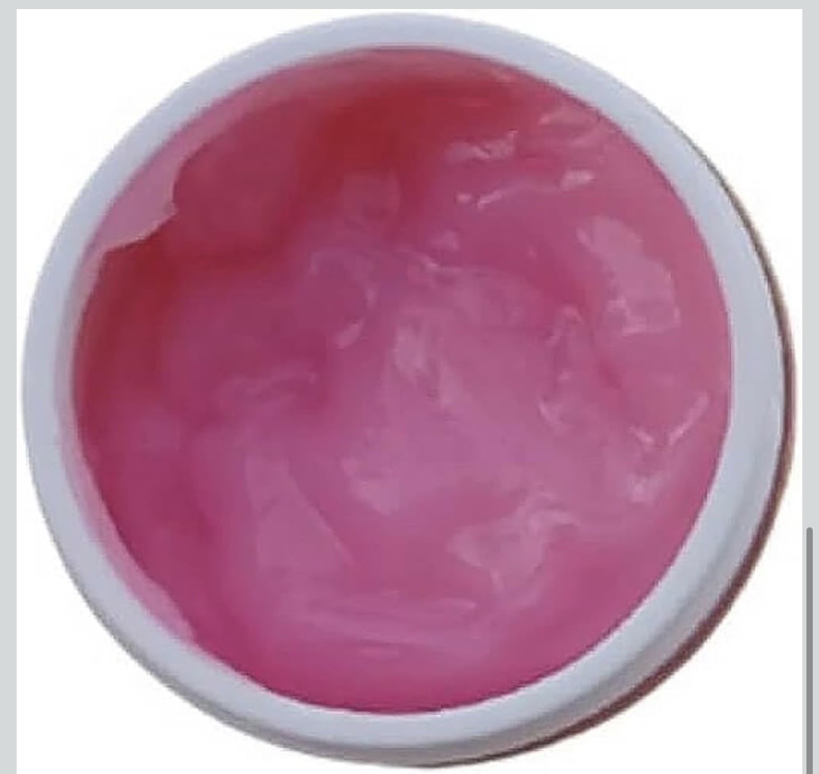 Textura rosa do Creme para Massagem Rhenuks